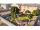 Aerial view showing backyard with fire pit and play area at 9931 W Odeum Ln, Tolleson, AZ 85353