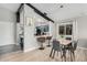 Modern dining area with grey chairs and a light wood table at 10103 E Olla Ave, Mesa, AZ 85212