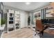 Bright home office features built-in shelving and a workspace at 10103 E Olla Ave, Mesa, AZ 85212