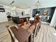 Dining room featuring modern lighting and furniture, with a view into the kitchen at 10113 E Topaz Dr, Scottsdale, AZ 85258