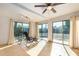 Sunroom with sliding glass doors and tiled floor at 1133 E Dust Devil Dr, San Tan Valley, AZ 85143