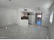 Bright kitchen features white cabinets, dark countertops, and modern appliances at 12221 W Bell Rd # 363, Surprise, AZ 85378