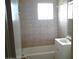 Bathroom with tiled tub/shower and vanity at 1340 E Crescent Ave, Mesa, AZ 85204