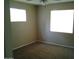 Bright bedroom with neutral walls and carpet at 1340 E Crescent Ave, Mesa, AZ 85204