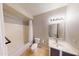 Bathroom features a tub, toilet, sink, and vanity at 1445 E Broadway Rd # 222, Tempe, AZ 85282