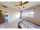 Comfortable bedroom with ceiling fan and carpet at 1445 E Broadway Rd # 222, Tempe, AZ 85282