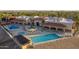 Community pool, spa, and lounge area with ample seating at 147 S Los Cielos Ln, Casa Grande, AZ 85194