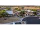 Community clubhouse with parking and surrounding landscape at 147 S Los Cielos Ln, Casa Grande, AZ 85194