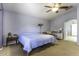 Main bedroom with ceiling fan and ample floor space at 147 S Los Cielos Ln, Casa Grande, AZ 85194