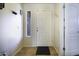 Simple entryway with tiled floor and white door at 147 S Los Cielos Ln, Casa Grande, AZ 85194