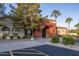 Community center entrance with landscaping and parking at 147 S Los Cielos Ln, Casa Grande, AZ 85194