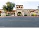 Mission Royale community center entrance with archway and landscaping at 147 S Los Cielos Ln, Casa Grande, AZ 85194