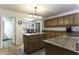 Modern kitchen with granite countertops and ample cabinetry at 147 S Los Cielos Ln, Casa Grande, AZ 85194