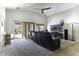 Relaxing living room featuring a large TV and comfortable seating at 147 S Los Cielos Ln, Casa Grande, AZ 85194