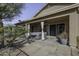 Relaxing backyard patio with hot tub, flagstone, and covered seating area at 147 S Los Cielos Ln, Casa Grande, AZ 85194