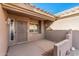 Well-lit front entrance with a security door and decorative accents at 15220 W Blue Verde Dr, Sun City West, AZ 85375