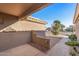 Inviting front patio with a walkway, landscaping, and a view of the neighborhood at 15220 W Blue Verde Dr, Sun City West, AZ 85375