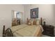 Bright bedroom with a queen-size bed, and ample closet space at 15240 N 142Nd Ave # 2159, Surprise, AZ 85379