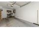 Spacious garage with overhead storage and ample space for tools at 15240 N 142Nd Ave # 2159, Surprise, AZ 85379