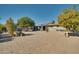 Spacious backyard features a covered patio and plenty of room for relaxation at 15489 N Ridgeview Rd, Sun City, AZ 85351