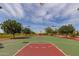 Outdoor basketball court with green and red surface at 15577 S 181St Ln, Goodyear, AZ 85338