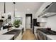 Modern kitchen with stainless steel appliances and farmhouse sink at 15577 S 181St Ln, Goodyear, AZ 85338