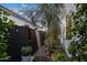 Relaxing outdoor shower with lush landscaping and privacy wall at 15577 S 181St Ln, Goodyear, AZ 85338