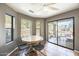 Inviting dining area with natural light, a wooden table, and views of the desert landscape at 16625 N Agate Knoll Pl, Fountain Hills, AZ 85268