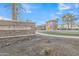 Community entrance sign with stonework and landscaping at 1671 E Dogwood Ln, Gilbert, AZ 85295