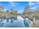 Serene community lake with a fountain and walking path at 1671 E Dogwood Ln, Gilbert, AZ 85295