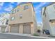 Three-story townhome with attached garage at 1671 E Dogwood Ln, Gilbert, AZ 85295