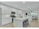 Modern kitchen with white cabinets and island at 1671 E Dogwood Ln, Gilbert, AZ 85295