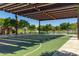 Outdoor basketball court with lake view at 18187 W Wind Song Ave, Goodyear, AZ 85338