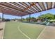 Community outdoor basketball court with covered seating at 18187 W Wind Song Ave, Goodyear, AZ 85338