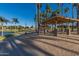 Community covered picnic area with tables and benches at 18187 W Wind Song Ave, Goodyear, AZ 85338