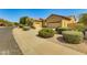 Beautiful desert landscape home with a two car garage at 18187 W Wind Song Ave, Goodyear, AZ 85338