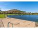 Relax and enjoy a game of horseshoes by the lake at 18187 W Wind Song Ave, Goodyear, AZ 85338