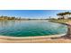 Stunning view of a calm lake and clear blue sky at 18187 W Wind Song Ave, Goodyear, AZ 85338