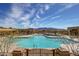 Resort-style swimming pool with mountain views, offering residents a luxurious and relaxing outdoor experience at 18187 W Wind Song Ave, Goodyear, AZ 85338