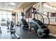 Fitness center with cardio and stair machines at 18439 W Wind Song Ave, Goodyear, AZ 85338