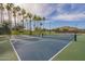 Well-maintained tennis and pickleball courts at 18439 W Wind Song Ave, Goodyear, AZ 85338