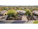 Aerial view of a single-story house with a large backyard and pool at 19007 E Lazo Ct, Rio Verde, AZ 85263