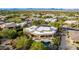 Aerial view showing a luxurious home, pool, and surrounding landscape at 19007 E Lazo Ct, Rio Verde, AZ 85263