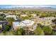 Aerial view showcasing house, pool, and desert landscaping at 19007 E Lazo Ct, Rio Verde, AZ 85263