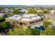 Aerial view showcasing house, pool, and desert landscaping at 19007 E Lazo Ct, Rio Verde, AZ 85263