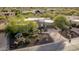 Single story home with desert landscaping and driveway at 19007 E Lazo Ct, Rio Verde, AZ 85263