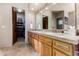 Double vanity bathroom with a large mirror and ample storage at 19007 E Lazo Ct, Rio Verde, AZ 85263