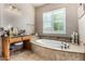 Relax in this spa-like bathroom, featuring a large soaking tub and a separate shower at 19007 E Lazo Ct, Rio Verde, AZ 85263