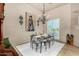 Bright dining room with chandelier and window seating at 19007 E Lazo Ct, Rio Verde, AZ 85263