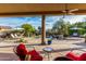 Relaxing pool area with patio furniture and lush landscaping at 19007 E Lazo Ct, Rio Verde, AZ 85263